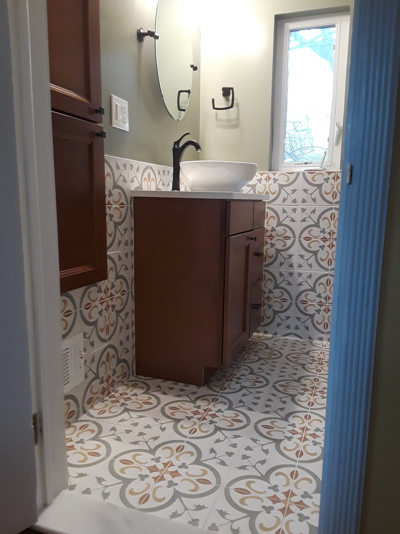 ceramic tile installation complete for full bathroom remodel