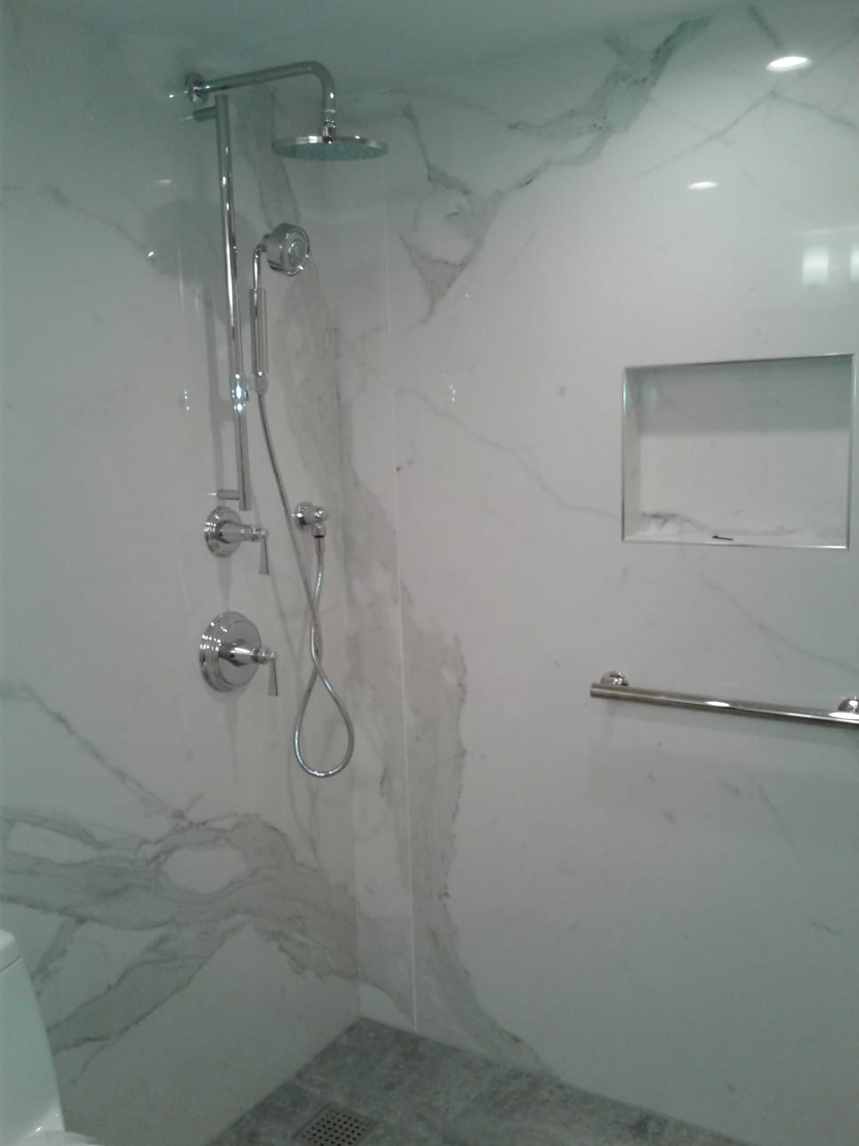 tile shower remodel with ceramic tile