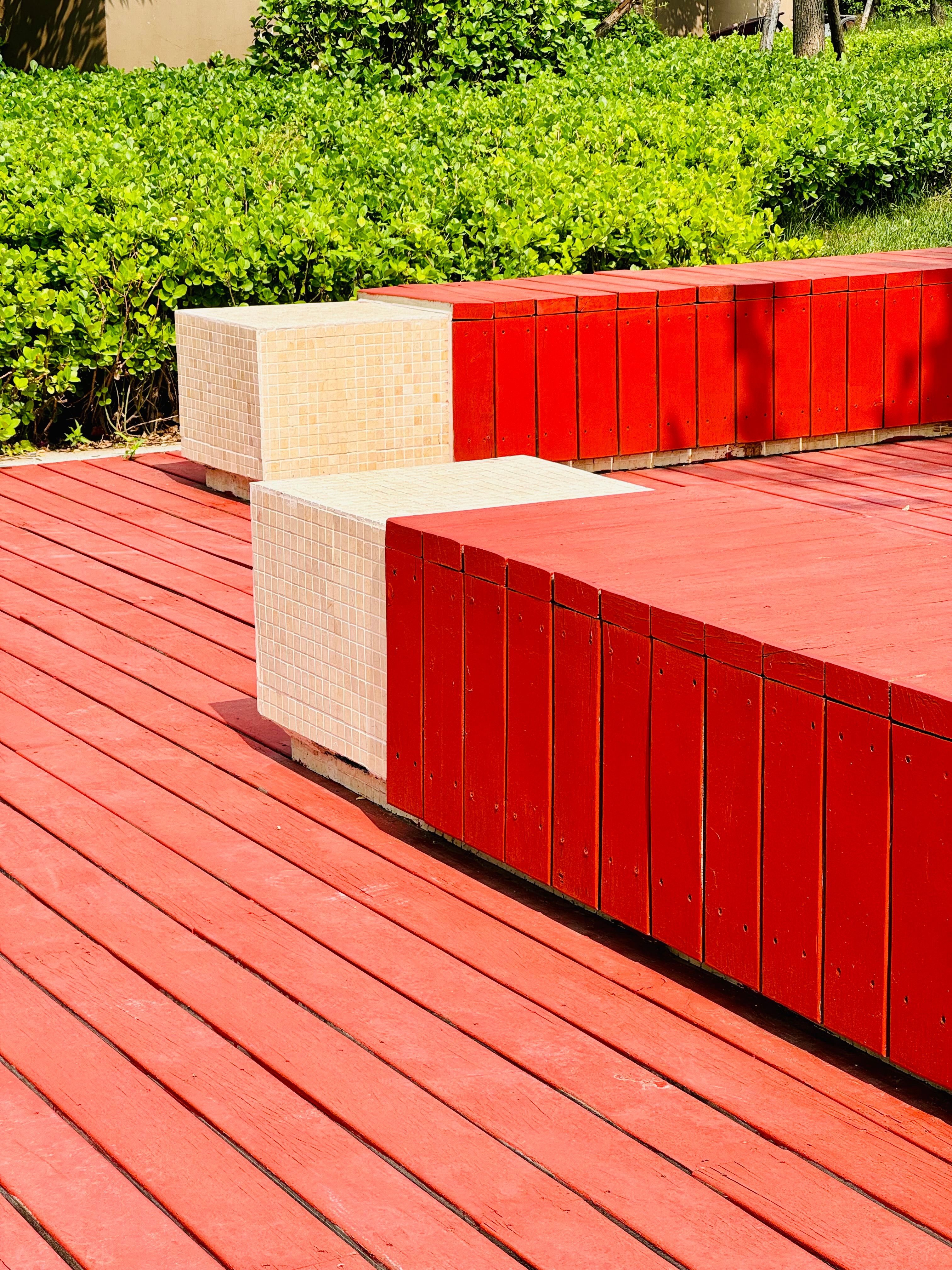 freshly stained red exterior deck